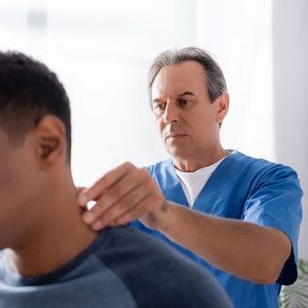 Doctors perform diagnostic tests on patients with neck pain