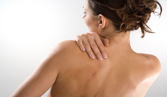 The woman is worried about the pain under the left shoulder blade in the back